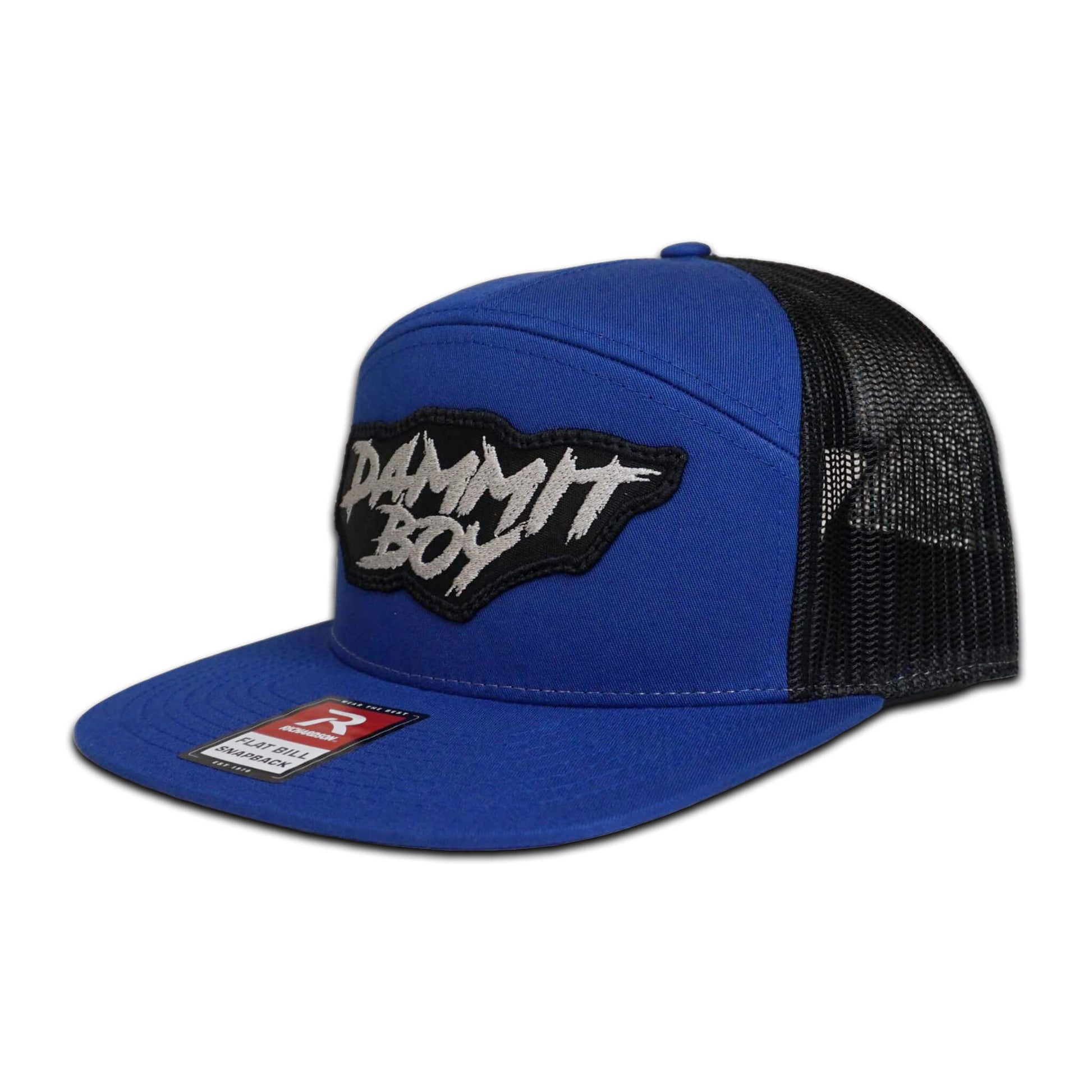 Shop the Project Torque “Dammit Boy” Flat Bill Snapback. One size fits all. Blue hat with black mesh back for breathability. This image shows the side view of the snapback highlighting the black mesh back.